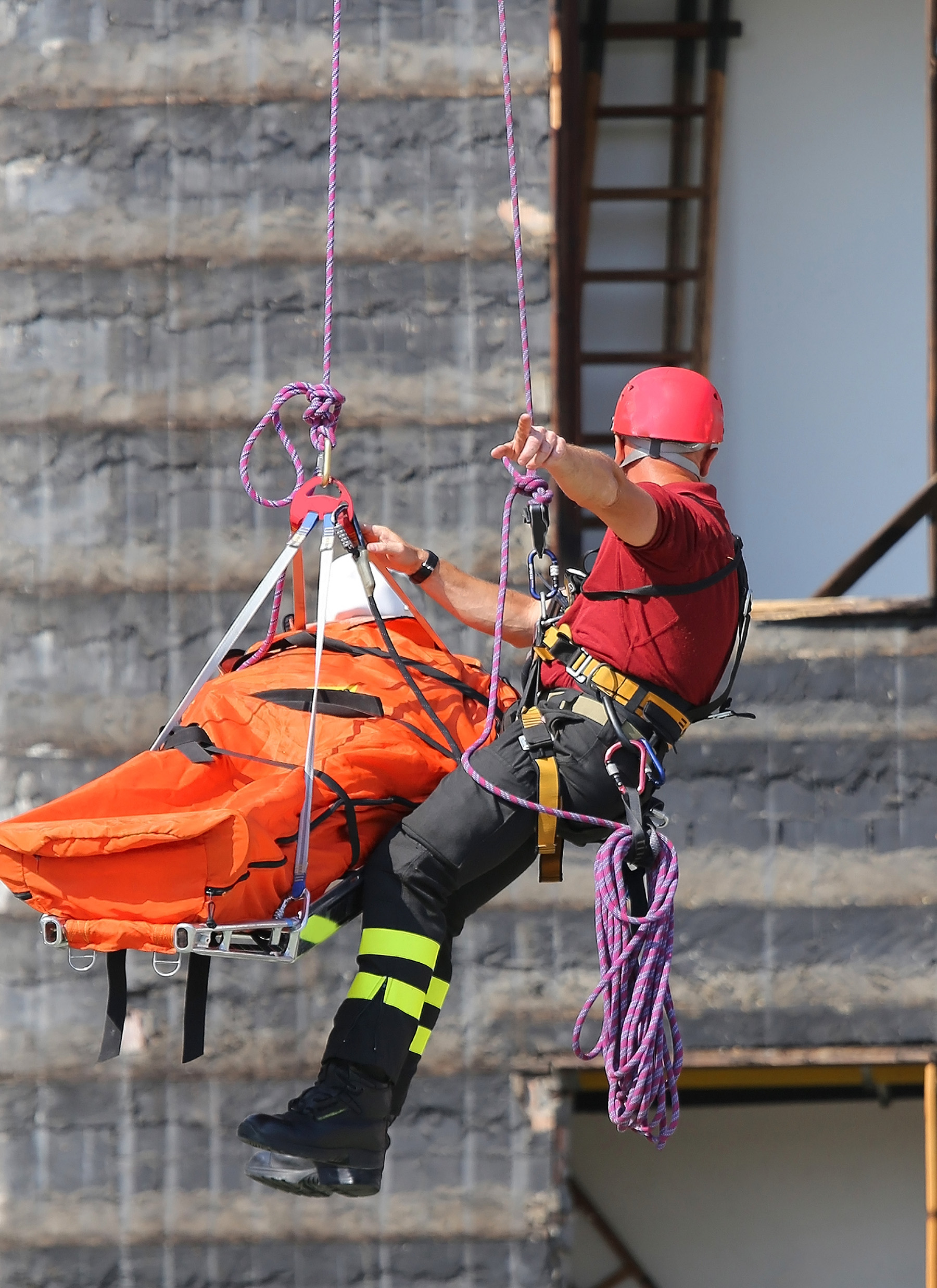 Fire rescue rope image - firefighter abseiling with rope